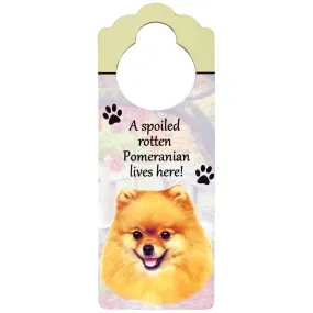 A Spoiled Pomeranian Lives Here Hanging Doorknob Sign