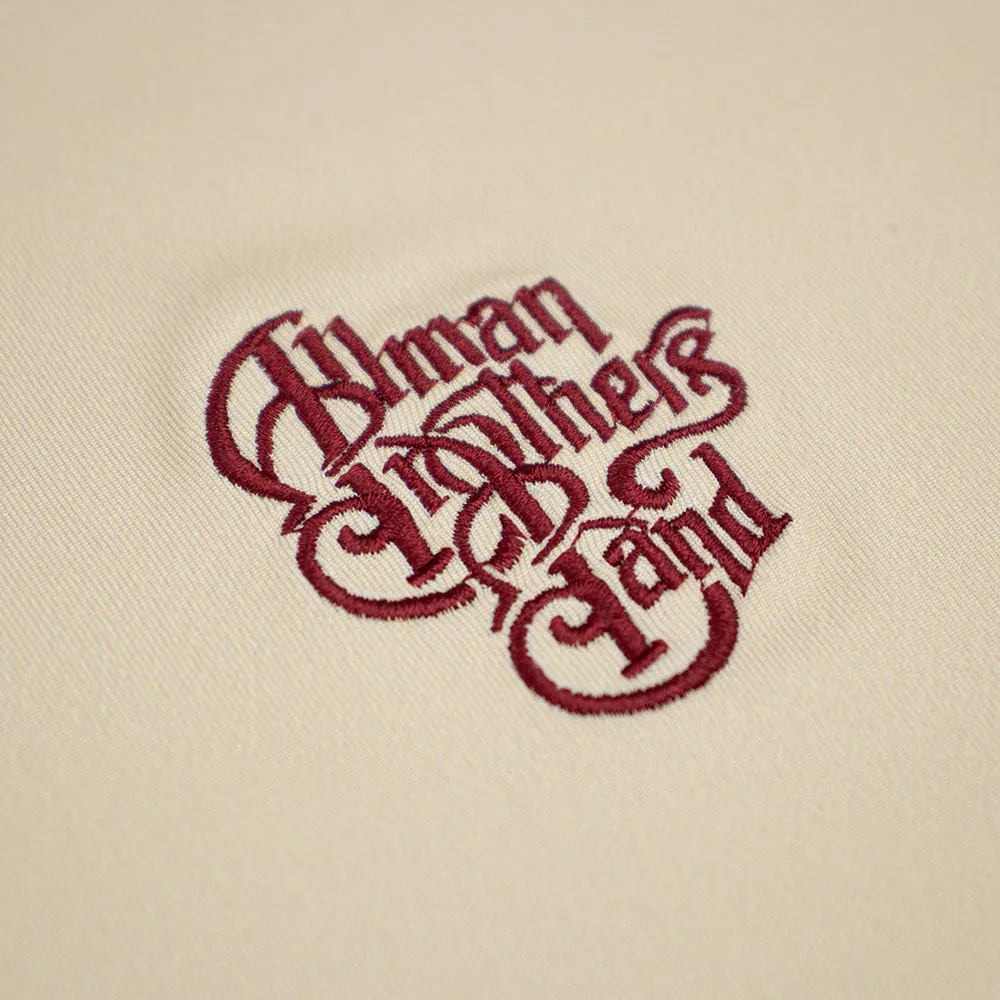 Allman Brothers Band | Performance Polo |  Logo on Tan