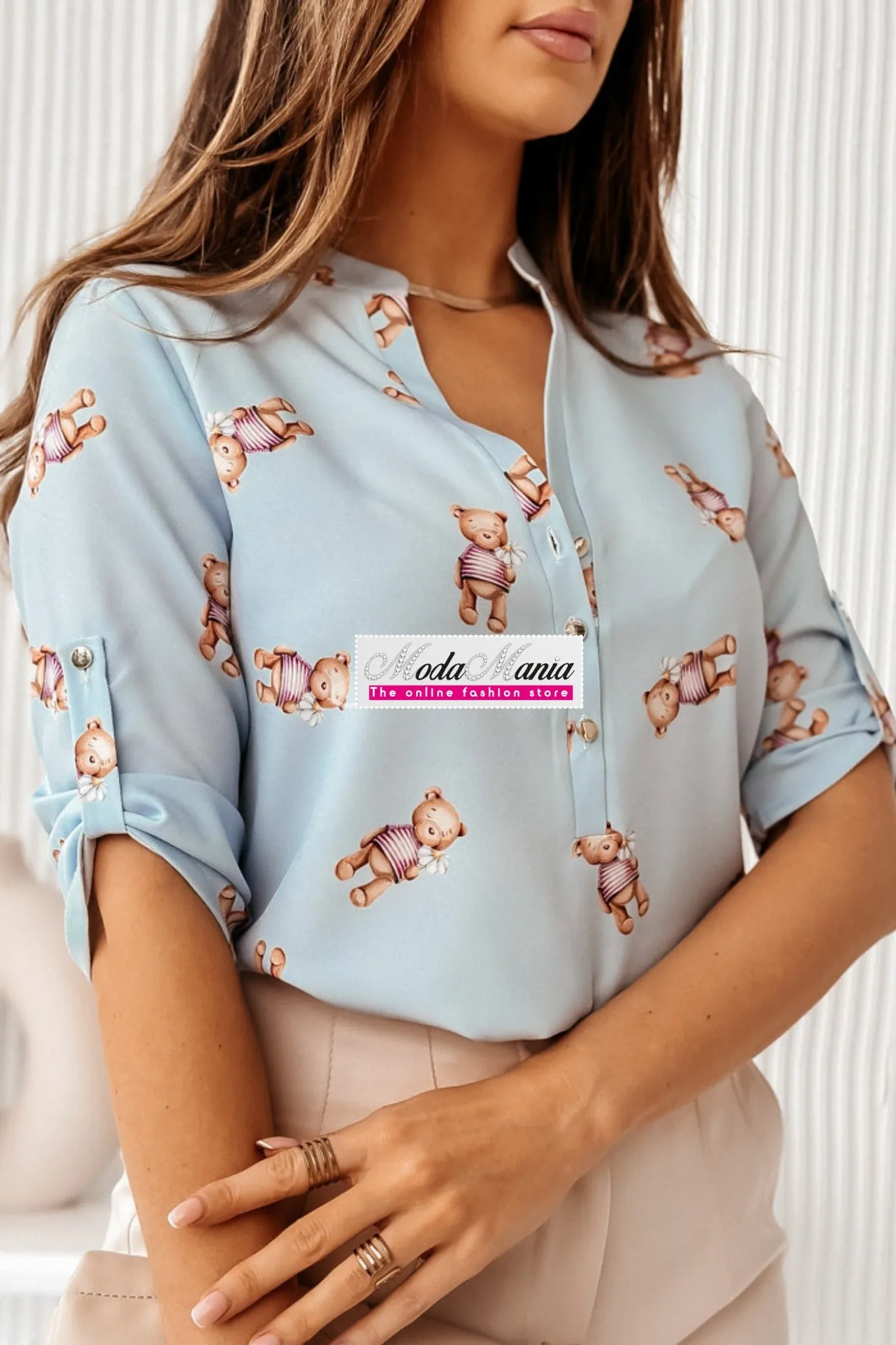 Blusa celeste a fantasia orsetti con maniche tre quarti e bottoni dorati