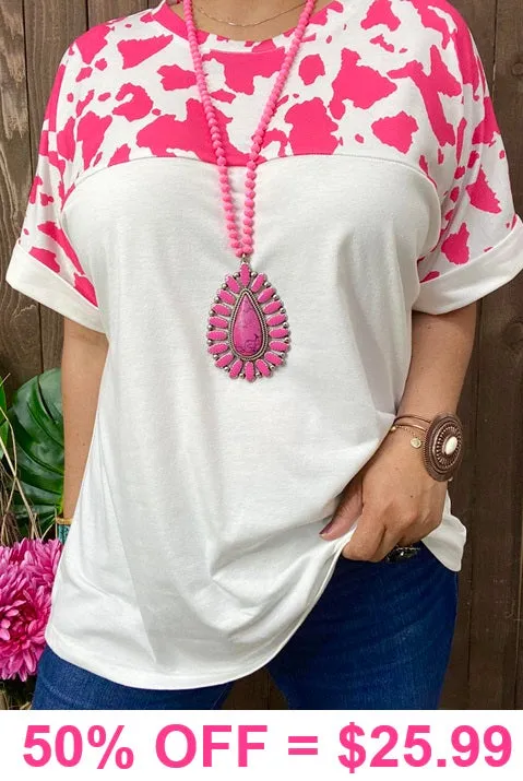 White Top with pink cow print short sleeves